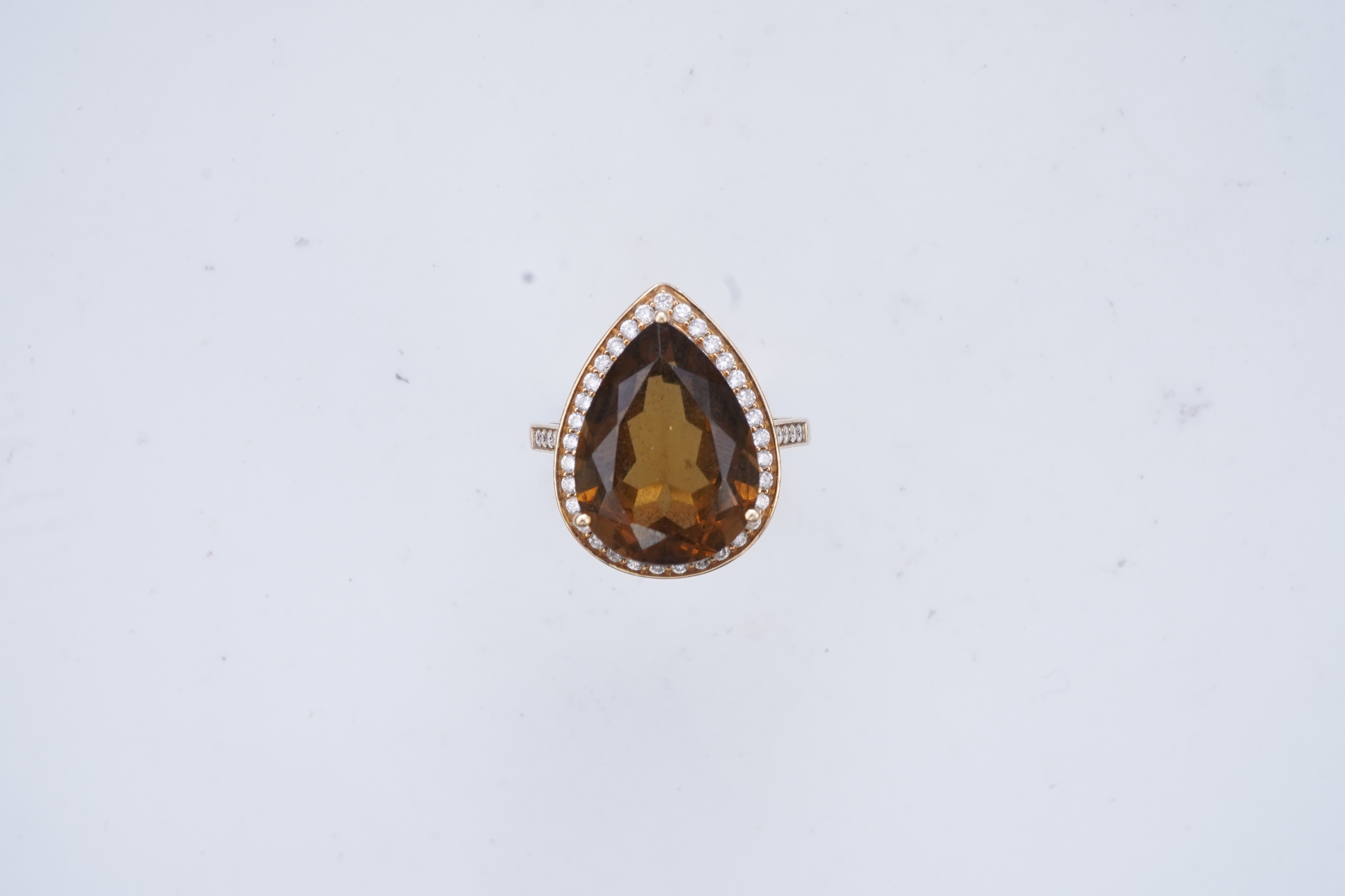 A smoky quartz and diamond ring
